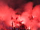 Fans de football avec leurs fumigènes