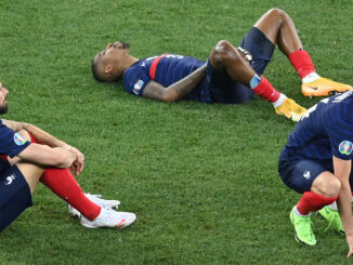 Véritable claque sportive pour l'équipe de France, sortie par la Suisse en huitième de finale. (Crédits : Daniel MIHAILESCU / POOL / AFP)