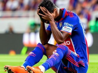 Un joueur de l'OL accablé sur le terrain, DALL-E